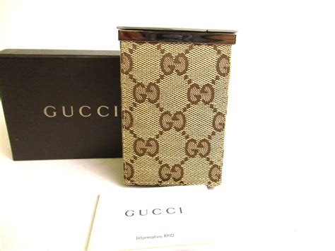 gucci canvas cigarette case.